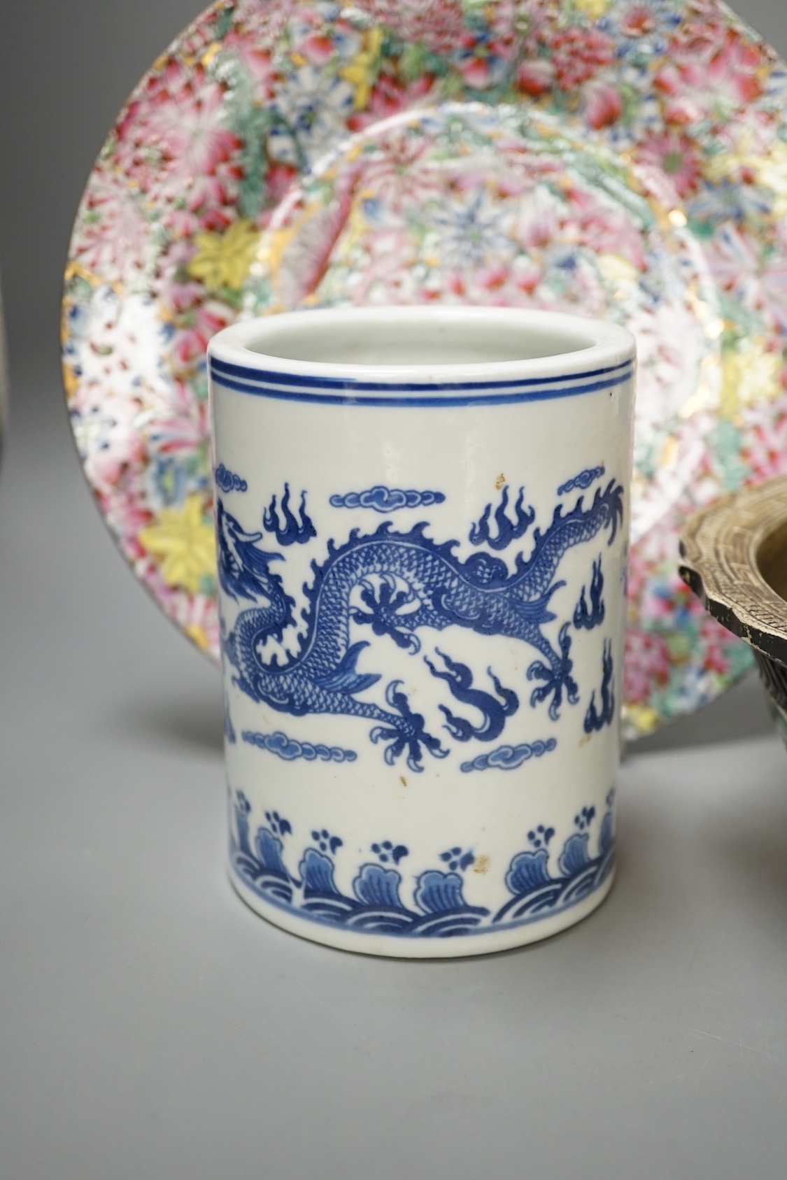 A Chinese porcelain bowl, brush pot, plate and a pair of dogs